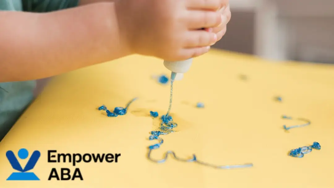 Sensory integration therapy autism: A toddler enjoys finger painting to build motor skills and improve touch tolerance through colorful play.